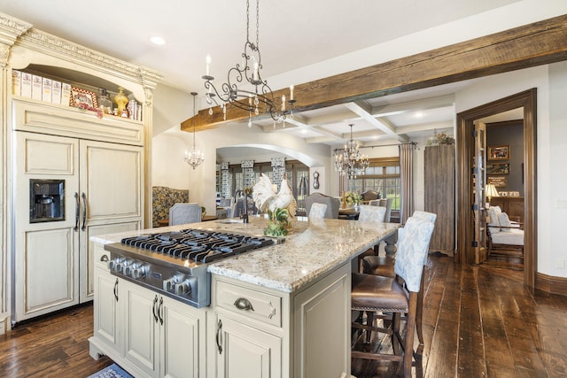 845 W Farm Road 96, Springfield, MO 65803 - kitchen with dark wood-style floors, an inviting chandelier, coffered ceiling, and stainless steel gas stovetop