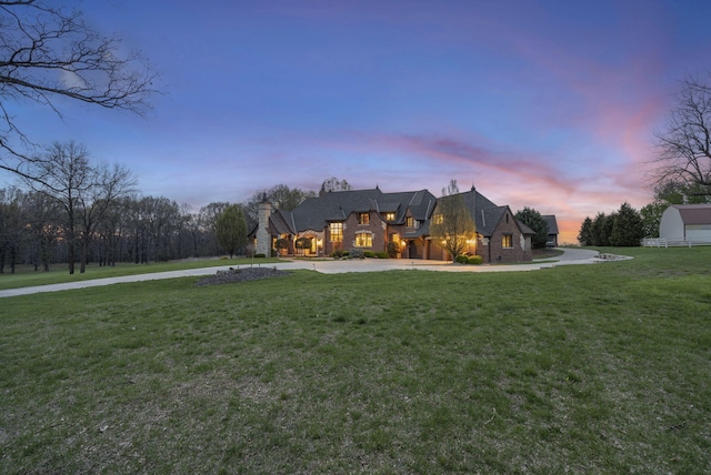 845 W Farm Road 96, Springfield, MO 65803 - french country inspired facade with curved driveway and a yard