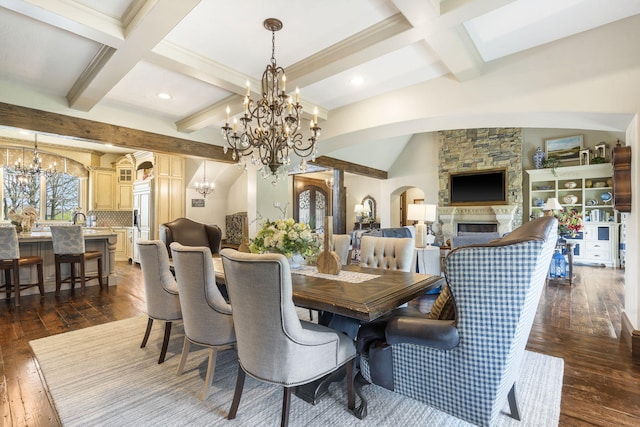 845 W Farm Road 96, Springfield, MO 65803 - dining room with arched walkways, dark wood-style flooring, a chandelier, and beam ceiling