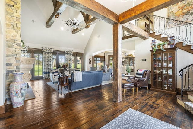845 W Farm Road 96, Springfield, MO 65803 - living room featuring beamed ceiling, high vaulted ceiling, hardwood / wood-style floors, and stairway