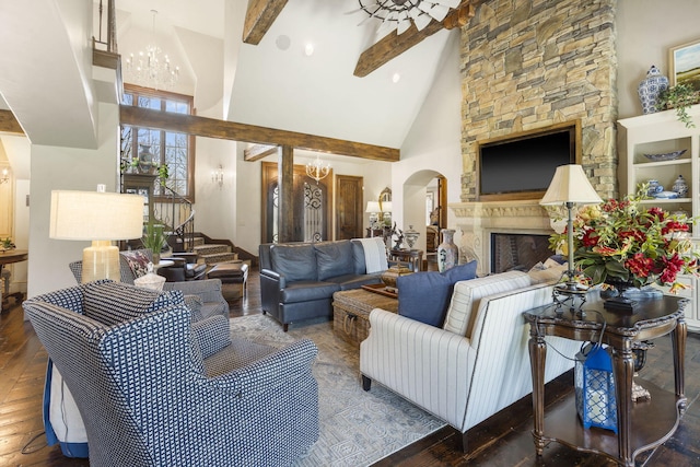 845 W Farm Road 96, Springfield, MO 65803 - living room featuring wood-type flooring, a large fireplace, high vaulted ceiling, and an inviting chandelier