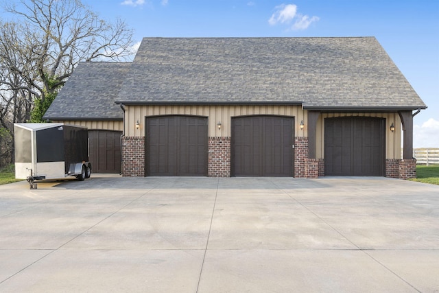 845 W Farm Road 96, Springfield, MO 65803 - garage with concrete driveway