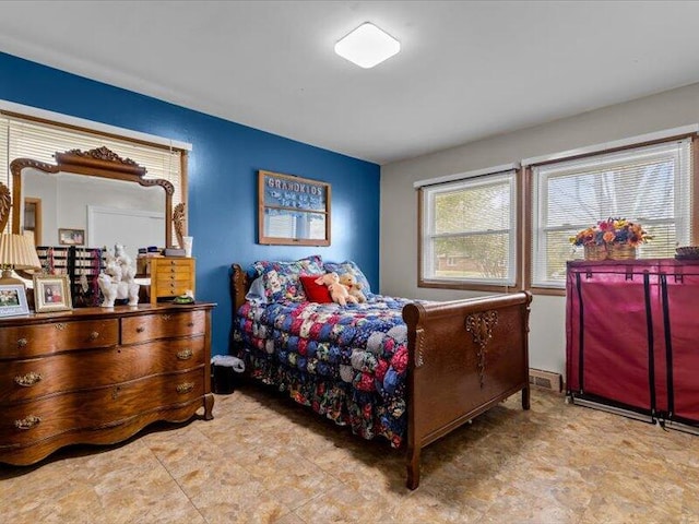 bedroom featuring visible vents