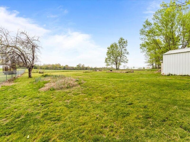 view of yard with fence