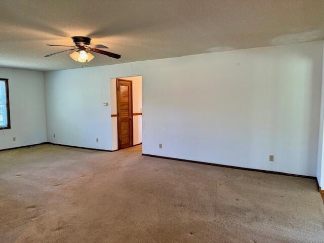 700 Ridgeway, Mountain View, MO 65548 - carpeted spare room featuring baseboards and ceiling fan