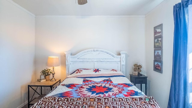 bedroom with crown molding and ceiling fan