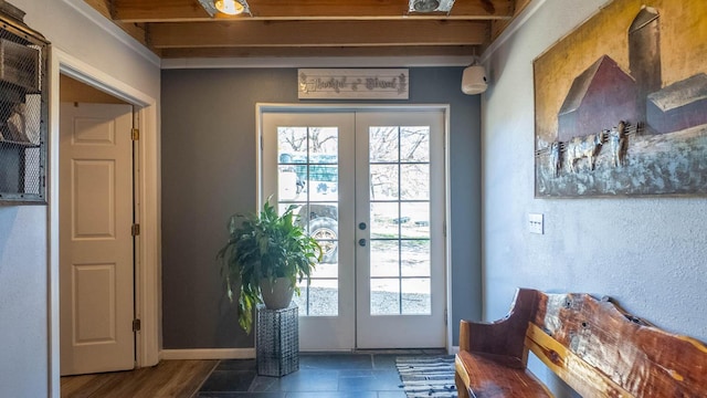 entryway with a wealth of natural light and french doors