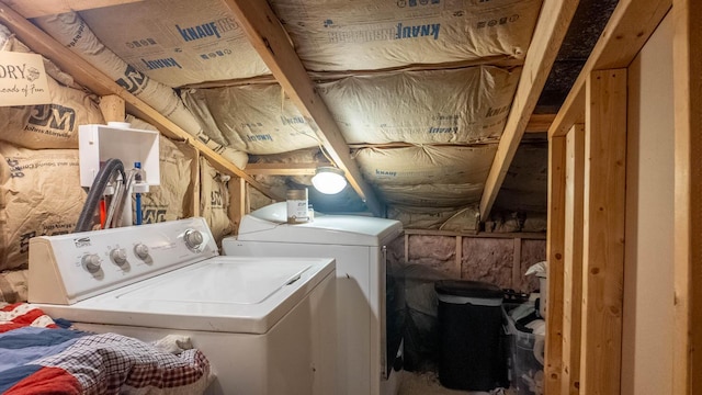 laundry area featuring washing machine and clothes dryer