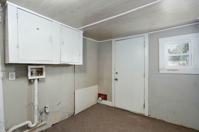 laundry area with carpet floors, washer hookup, and cabinet space