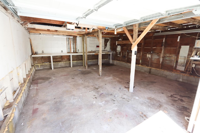 419 E Olive St, Bolivar, MO 65613 - garage featuring a garage door opener