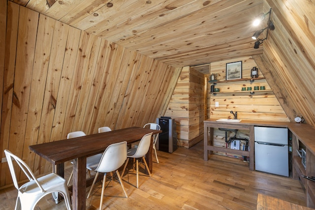 118 Bethel Rd, Long Lane, MO 65590 - unfurnished office with wood ceiling, light wood-style flooring, wood walls, and lofted ceiling