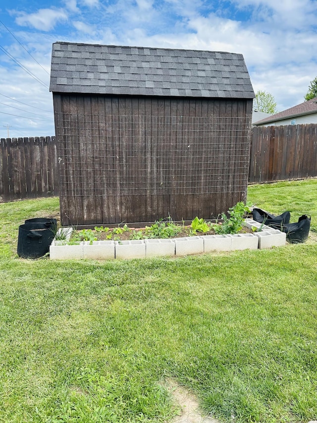 4723 W Portland St, Springfield, MO 65802 - view of yard with a shed, an outbuilding, and a vegetable garden