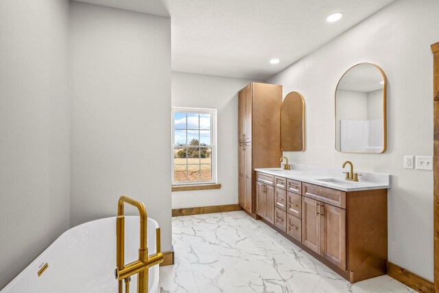 10560 State Highway U, Rogersville, MO 65742 - full bathroom featuring marble finish floors, a soaking tub, double vanity, recessed lighting, and baseboards