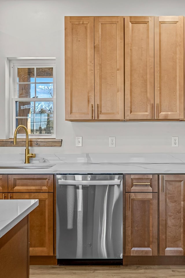 10560 State Highway U, Rogersville, MO 65742 - kitchen featuring dishwasher, a sink, light wood-type flooring, and light stone counters