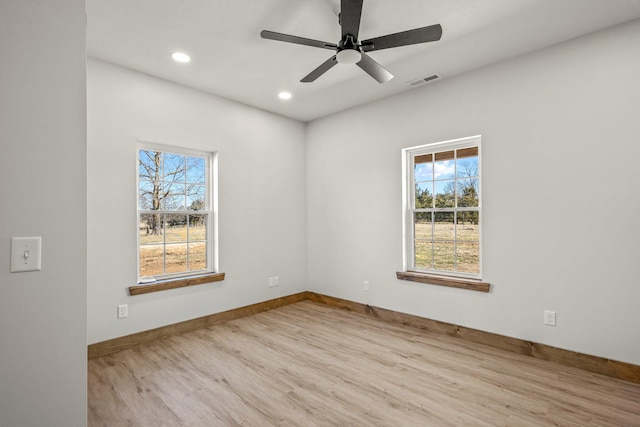 10560 State Highway U, Rogersville, MO 65742 - spare room with healthy amount of natural light, wood finished floors, baseboards, recessed lighting, and a ceiling fan