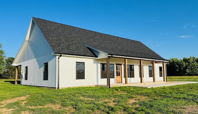 10560 State Highway U, Rogersville, MO 65742 - rear view of house with a yard and a shingled roof