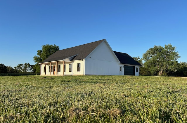 10560 State Highway U, Rogersville, MO 65742 - view of side of property with a garage and a lawn