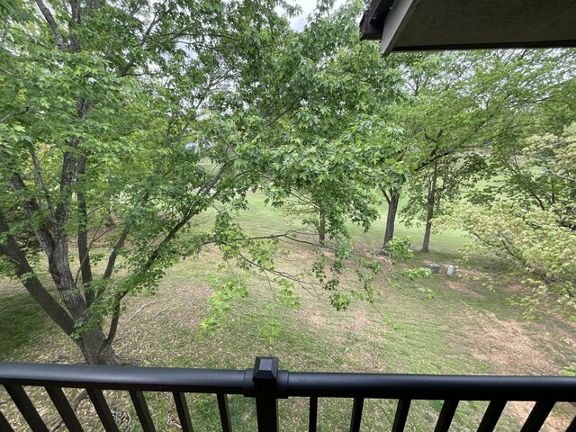 187 Clubhouse Dr Unit 23, Branson, MO 65616 - view of yard with a balcony