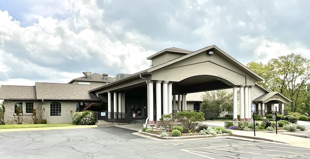 187 Clubhouse Dr Unit 23, Branson, MO 65616 - view of building exterior with uncovered parking