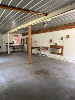 basement featuring a wall mounted AC