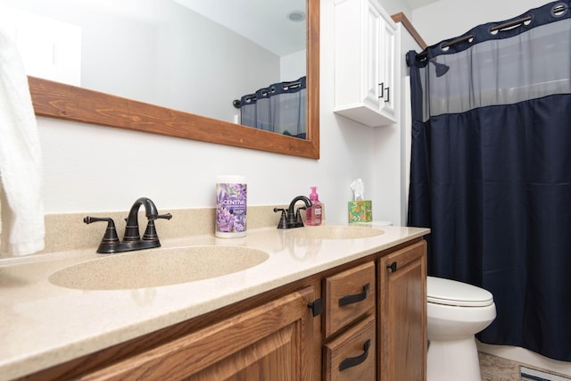 24 Village Trl Unit 5-8, Branson, MO 65616 - bathroom with toilet, a sink, double vanity, and curtained shower