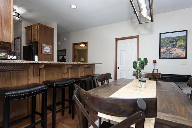 24 Village Trl Unit 5-8, Branson, MO 65616 - dining space with wood finished floors and recessed lighting