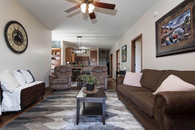 24 Village Trl Unit 5-8, Branson, MO 65616 - living area featuring ceiling fan with notable chandelier and wood finished floors