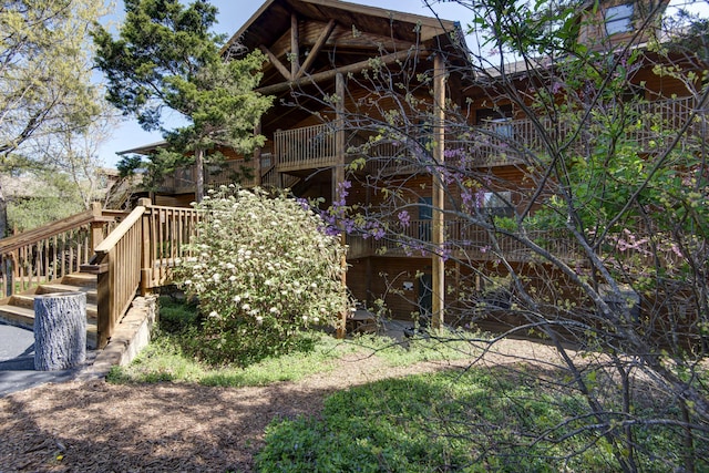 24 Village Trl Unit 5-8, Branson, MO 65616 - view of home's exterior featuring a balcony and stairs