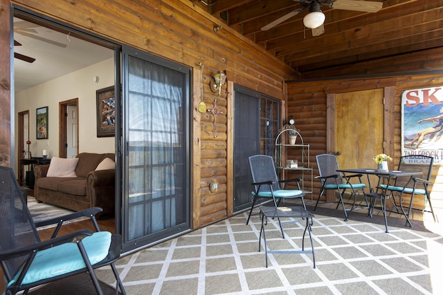 24 Village Trl Unit 5-8, Branson, MO 65616 - sunroom with outdoor dining area and a ceiling fan