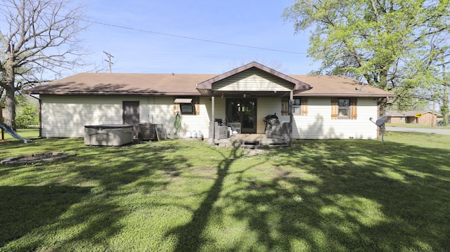 402 Lake, Mountain Grove, MO 65711 - back of house with a lawn, cooling unit, and covered porch