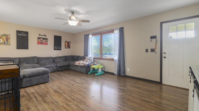 402 Lake, Mountain Grove, MO 65711 - living area featuring baseboards, a ceiling fan, and wood finished floors