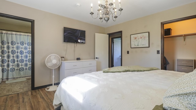 402 Lake, Mountain Grove, MO 65711 - bedroom with baseboards, a chandelier, dark wood-style floors, and a closet