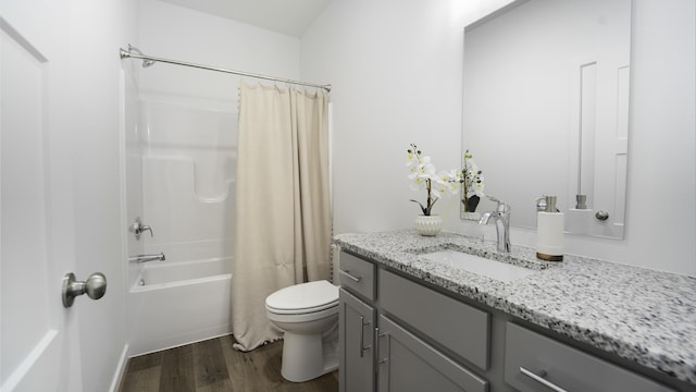 4074 E Ashwood Ct, Brookline, MO 65619 - bathroom featuring shower / tub combo, wood finished floors, toilet, and vanity