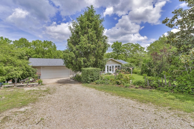 view of front of home featuring a garage and driveway