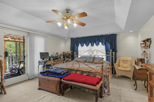 carpeted bedroom with access to outside and ceiling fan