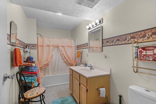 bathroom featuring a textured ceiling, visible vents, vanity, toilet, and shower / bath combo with shower curtain