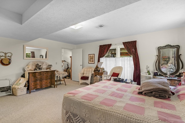 bedroom featuring carpet floors and visible vents