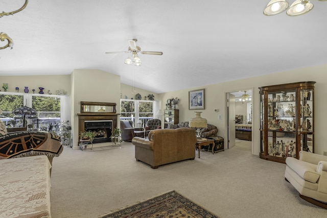 335 State Highway 265, Hollister, MO 65672 - carpeted living area with a ceiling fan, vaulted ceiling, and a fireplace with flush hearth