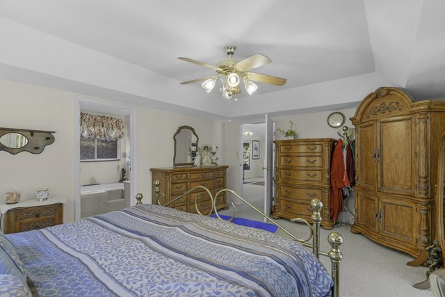 335 State Highway 265, Hollister, MO 65672 - bedroom with light colored carpet, connected bathroom, and a ceiling fan
