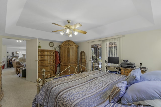 335 State Highway 265, Hollister, MO 65672 - bedroom with carpet flooring, a raised ceiling, access to exterior, and ceiling fan
