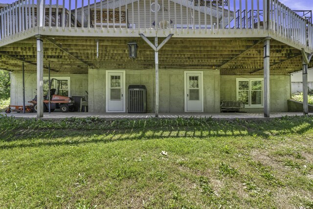 335 State Highway 265, Hollister, MO 65672 - rear view of property with a deck, a yard, a patio area, and central air condition unit