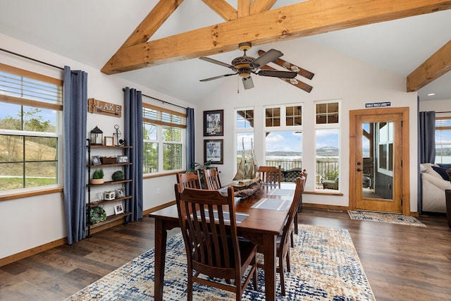 dining space with beamed ceiling, baseboards, a wealth of natural light, and ceiling fan