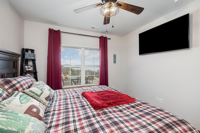 bedroom with visible vents and ceiling fan