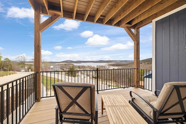 wooden terrace featuring a mountain view