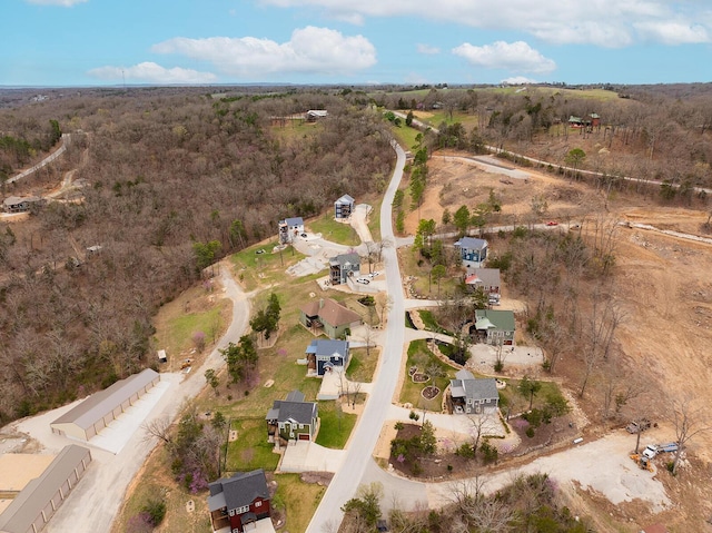 bird's eye view with a residential view and a forest view