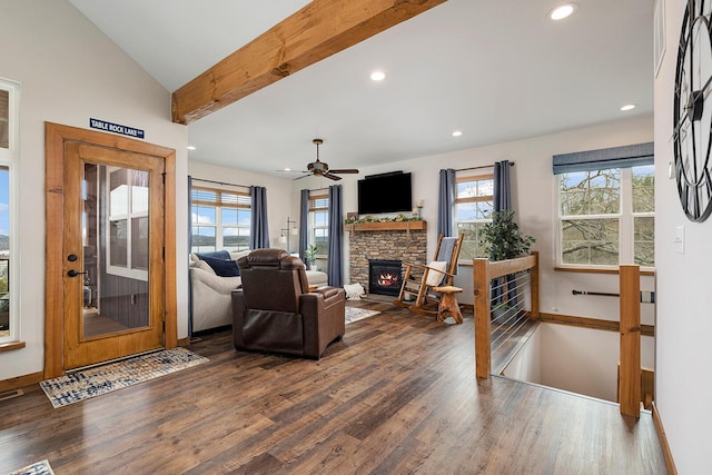 living area with recessed lighting, wood finished floors, and a wealth of natural light