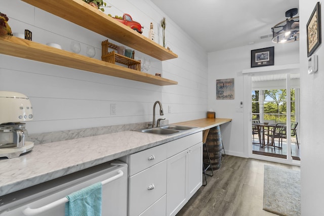 kitchen with open shelves, wood finished floors, a sink, white cabinets, and wine cooler