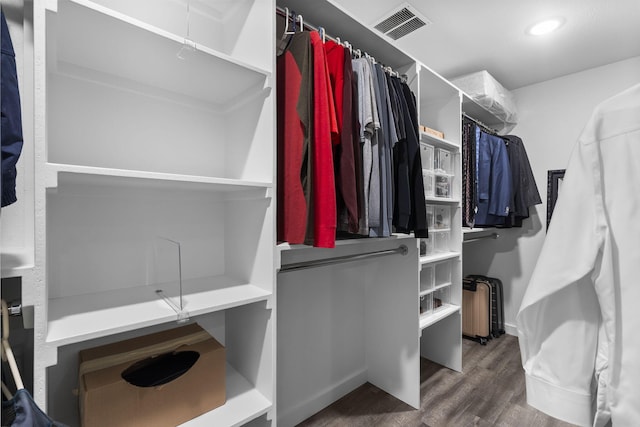 spacious closet with wood finished floors and visible vents
