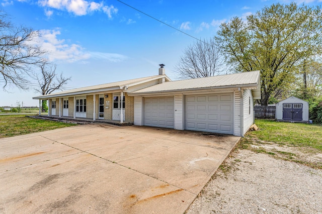 ranch-style house featuring a porch, a storage shed, fence, a front yard, and metal roof
