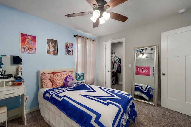 bedroom with carpet, a closet, a ceiling fan, and baseboards